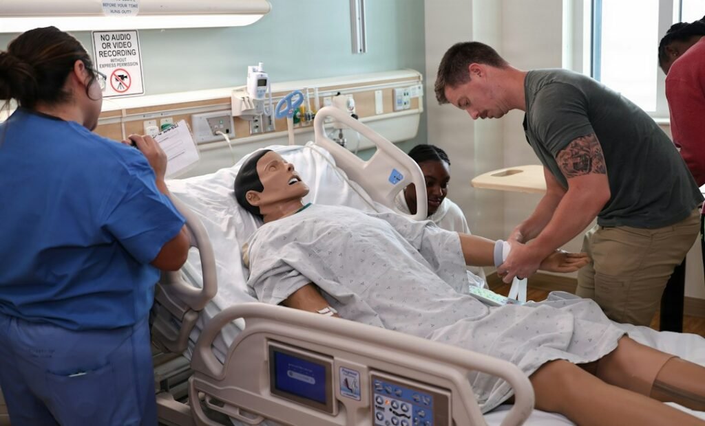 Healthcare professionals practicing CPR and emergency response during training in the UAE