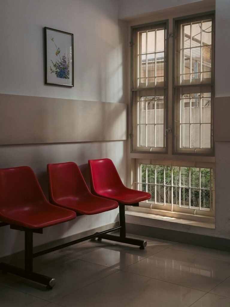 Modern clinic waiting area with patient seating and natural light