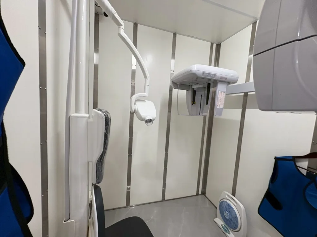 Dental X-ray room with panoramic imaging equipment and radiation-protection shielding