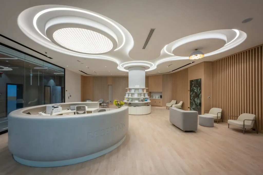 Modern healthcare clinic reception and waiting area in Dubai, illustrating patient-focused clinic interior design