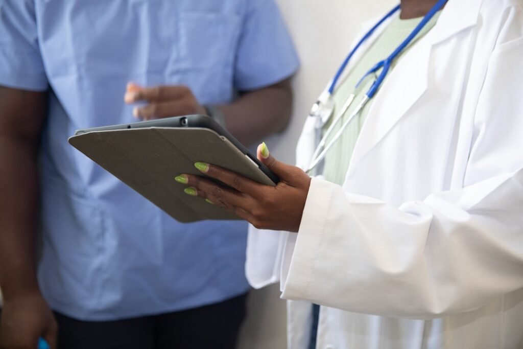 Healthcare professionals discussing patient care in a clinical setting