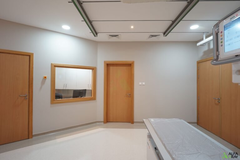 View of the Rashid Hospital imaging room showing lead-shielded doors and observation window